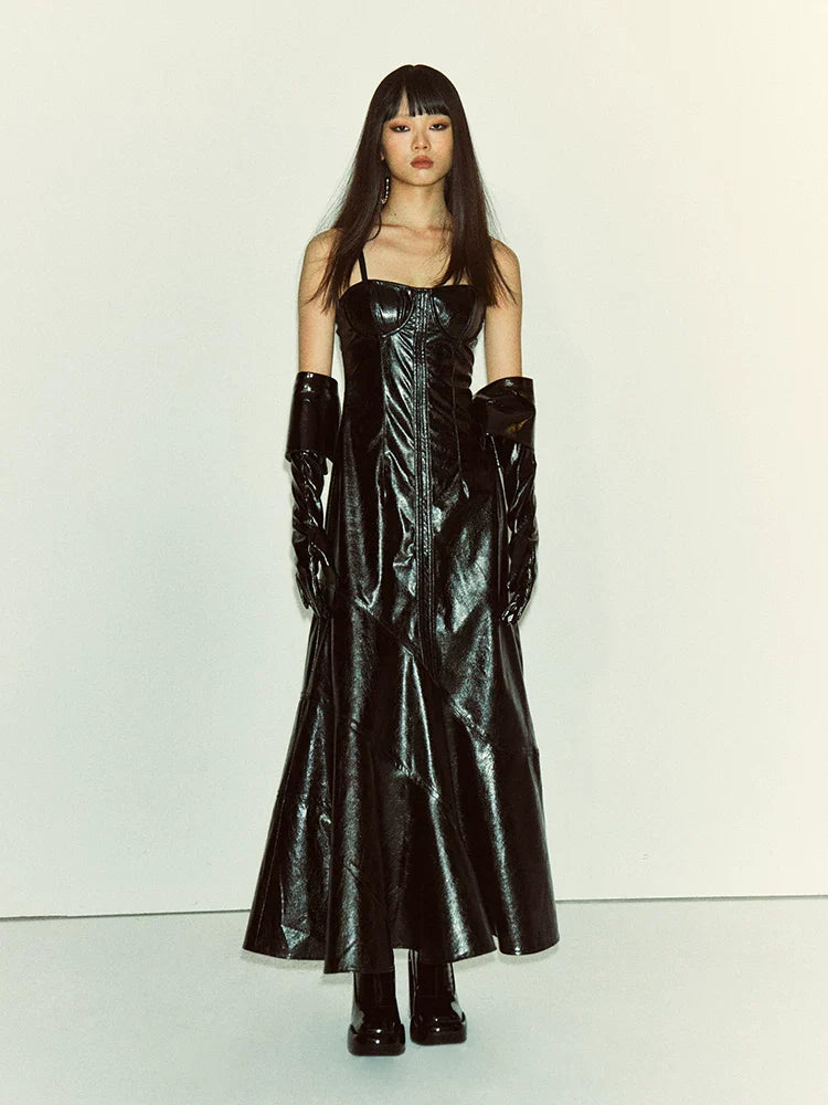 Full length view of the deconstructed faux leather maxi dress